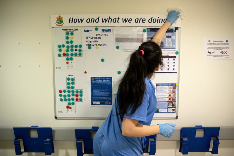 Andreea Cristina Badarau cleans the oncology ward. Photograph: Chris Maddaloni
