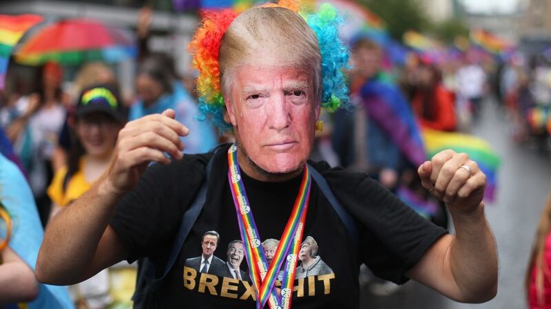A person wearing a Donald Trump mask during the Belfast Pride parade. Photograph: Niall Carson/PA Wire