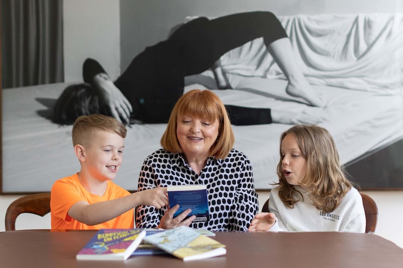 Laureate na nÓg: Patricia Forde with 12-year-old Brandon Daniel Losty and Conor Weafer, from Catherine McAuley National School in Dublin, at the announcement of her appointment. Photograph: Julien Behal
