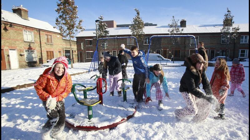 Children in Ormond Square in Dublin play in snow at the end of November 2010. File photograph: Brenda Fitzsimons/The Irish Times