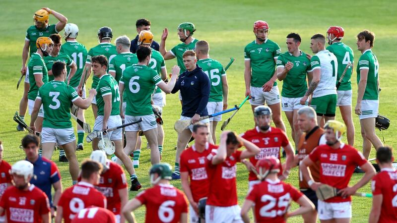 The Limerick team celebrate their win over Cork at the Gaelic Grounds. Photograph: James Crombie/Inpho