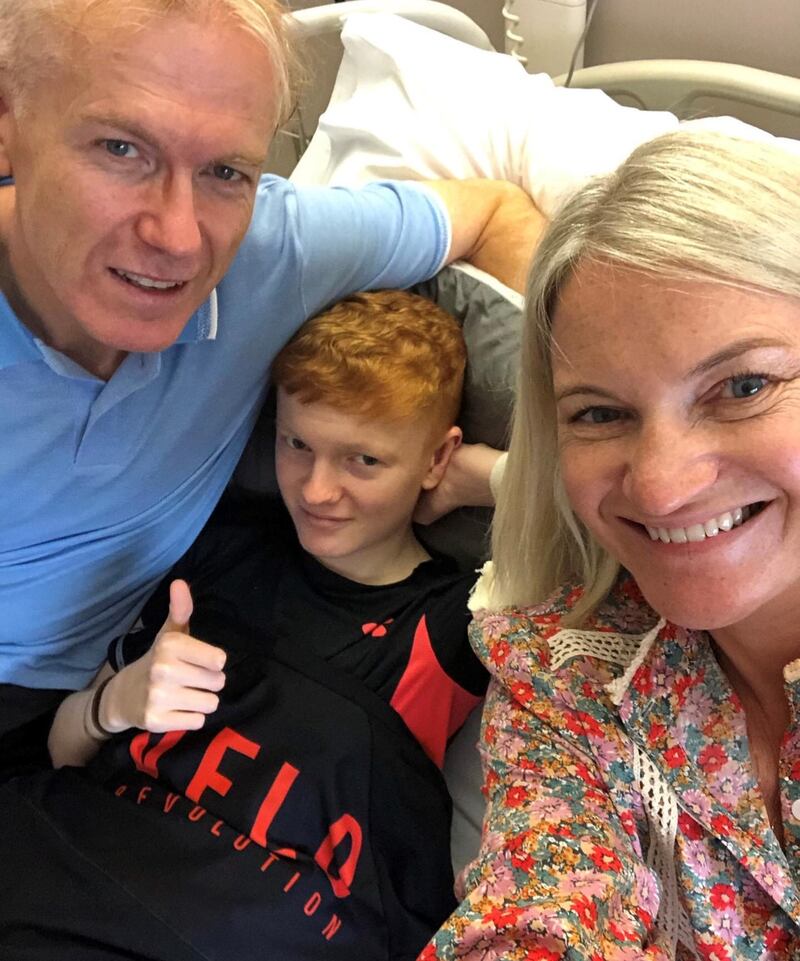 Peter and Louisa McEleney with Alex on the day of his Car-T cell therapy last May. Alex says his relapse was a mental drain for him but thinks it was worse for his mam and dad