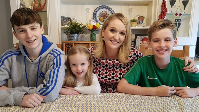 Karen with Jack (13), Daisy (5) and Harry (10)