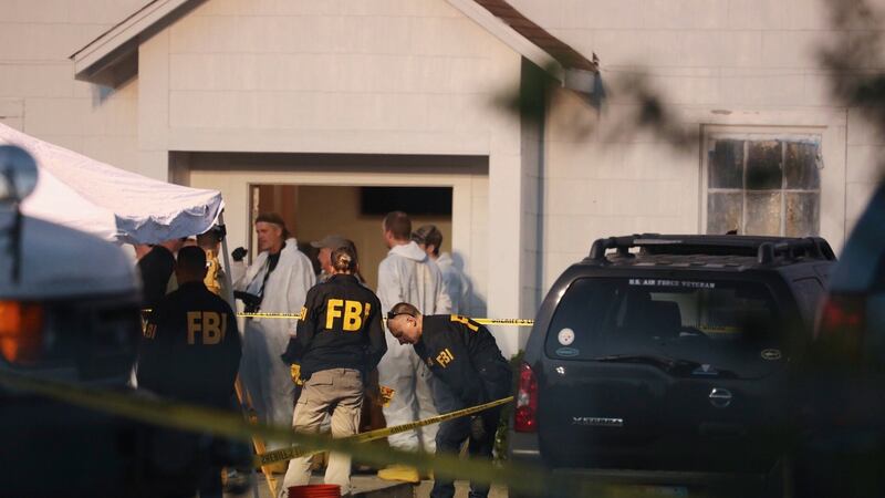 FBI agents and other law enforcement and crime scene personnel outside the First Baptist Church of Sutherland Springs, where a gunman wearing all black and a ballistic vest killed at least 26 people and injured at least 20 more, in Sutherland Springs, Texas, Nov. 5, 2017. Photograph: Callie Richmond/The New York Times