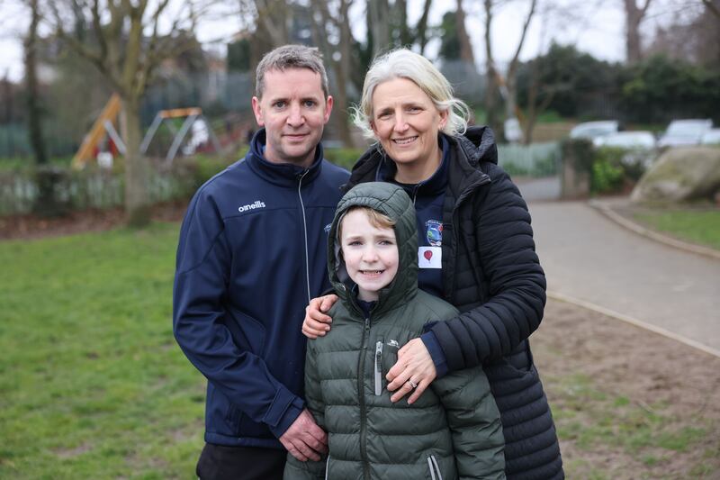 Stuart Banks with his wife, Ruth, and one of his sons, Paddy. Photograph: Dara Mac Dónaill