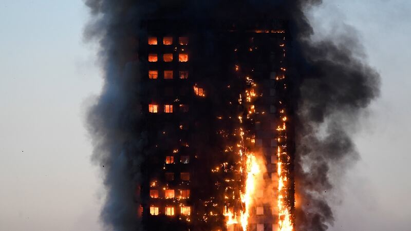 Flames and smoke billow as firefighters deal with a huge  fire in a tower block at Latimer Road in West London, Britain June 14, 2017. REUTERS/Toby Melville