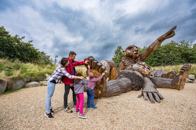 Nowanois, one of three giant sculptures by artist Thomas Dambo in the Sperrins, points the way in Glenelly valley