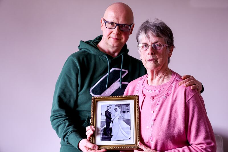 Patsy Kelly (junior), with his mum Teresa, holding their wedding picture.