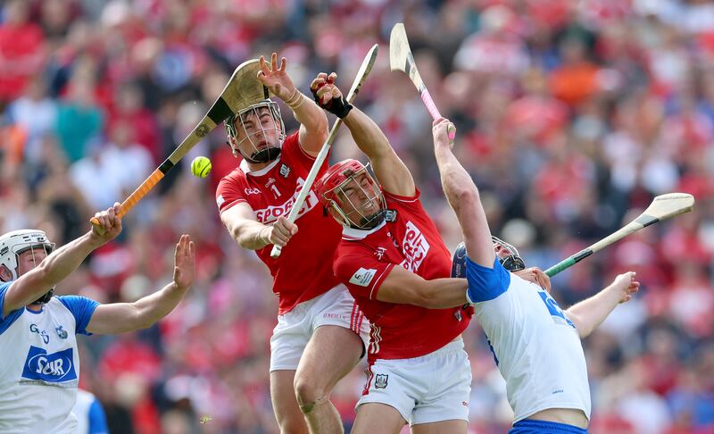 Waterford’s Shane Bennett and Stephen Bennett with Cork's Darragh Fitzgibbon and Ciarán Joyce. Photograph: James Crombie/Inpho