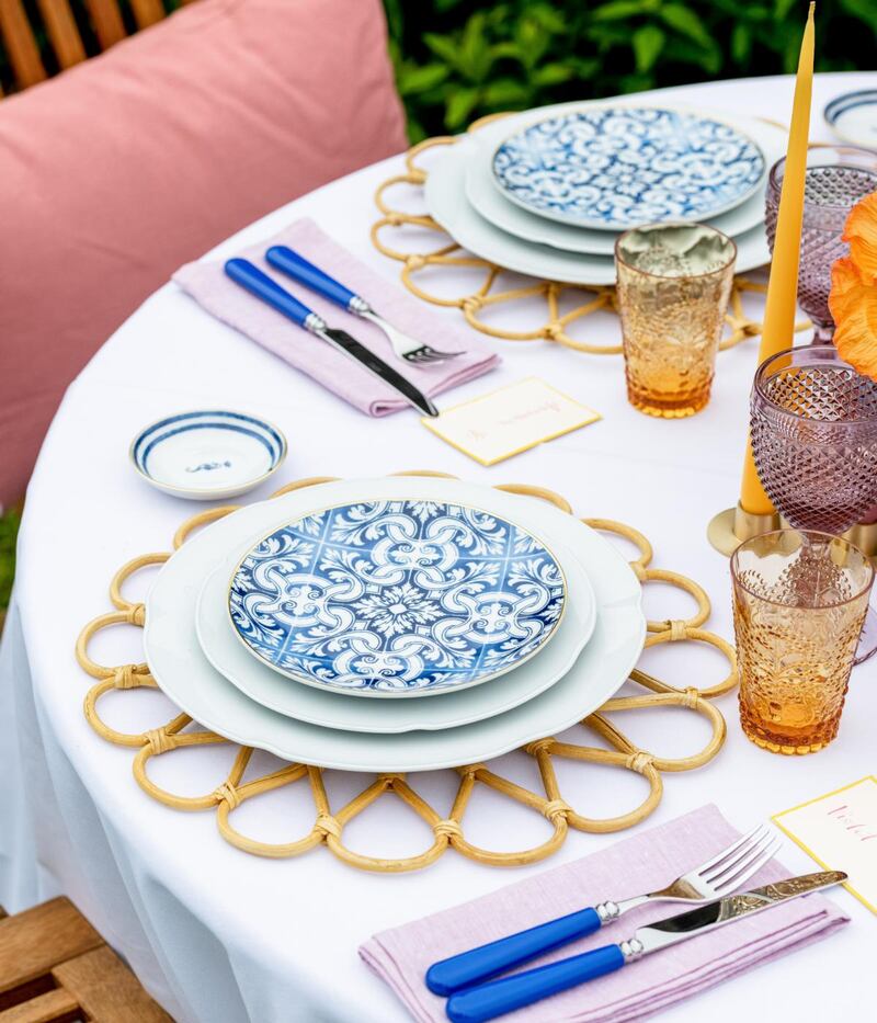 White crisp tablecloths look wonderful. Matching napkins in bright colours can transform a table