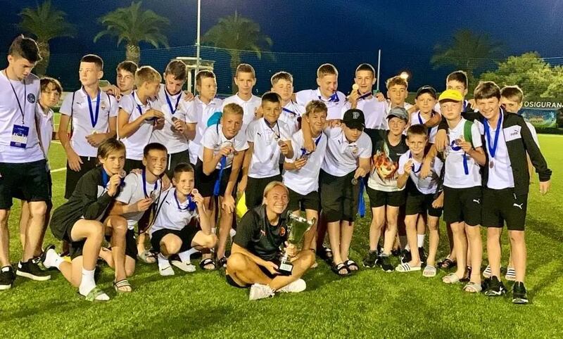 Ekateryna Afanasenko with a team of Shakhtar boys after they won the tournament in Split. Photograph: Shakhtar Donetsk