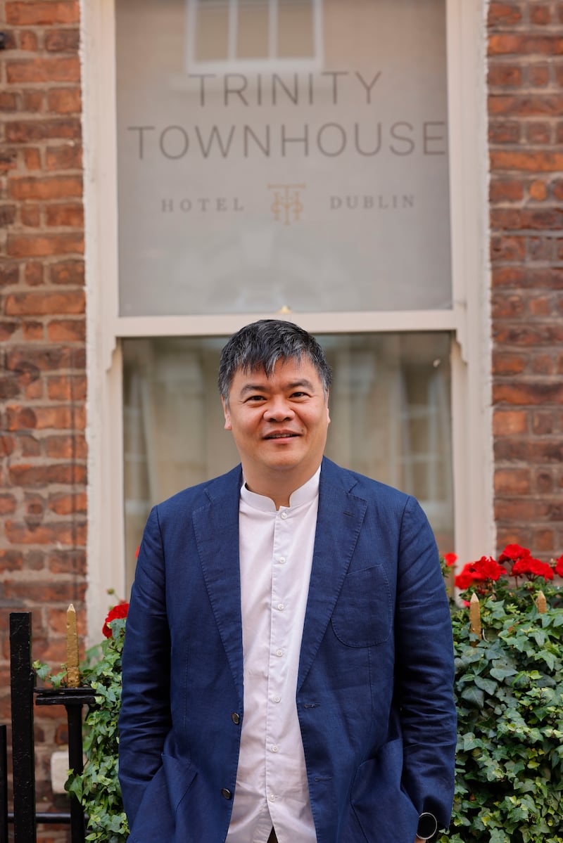 Peng Loh outside one of his properties, Trinity Townhouse in Dublin 2. The entrepreneur was born in Ireland and went to secondary school at St Columba's College in Dublin. Photograph: Alan Betson

