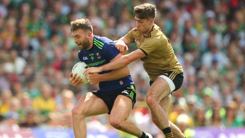 Aidan O’Shea in action against Kerry’s Adrian Spillane. Mayo job-share in sweeping around the D between Colm Boyle deep down in the hole and  O’Shea as a sort of scarecrow figure to ward off those who might chance it.  Photograph: James Crombie/Inpho