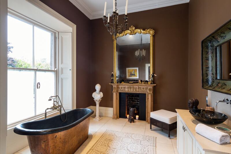 Bathroom with a gorgeous free-standing copper bath