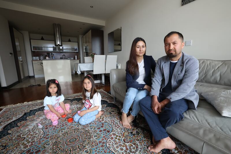 'I offered to pay half the fee. I am a taxi driver and I could work more hours. But they still said no.' Above, Bashir Barat and his family. Photograph: Nick Bradshaw
