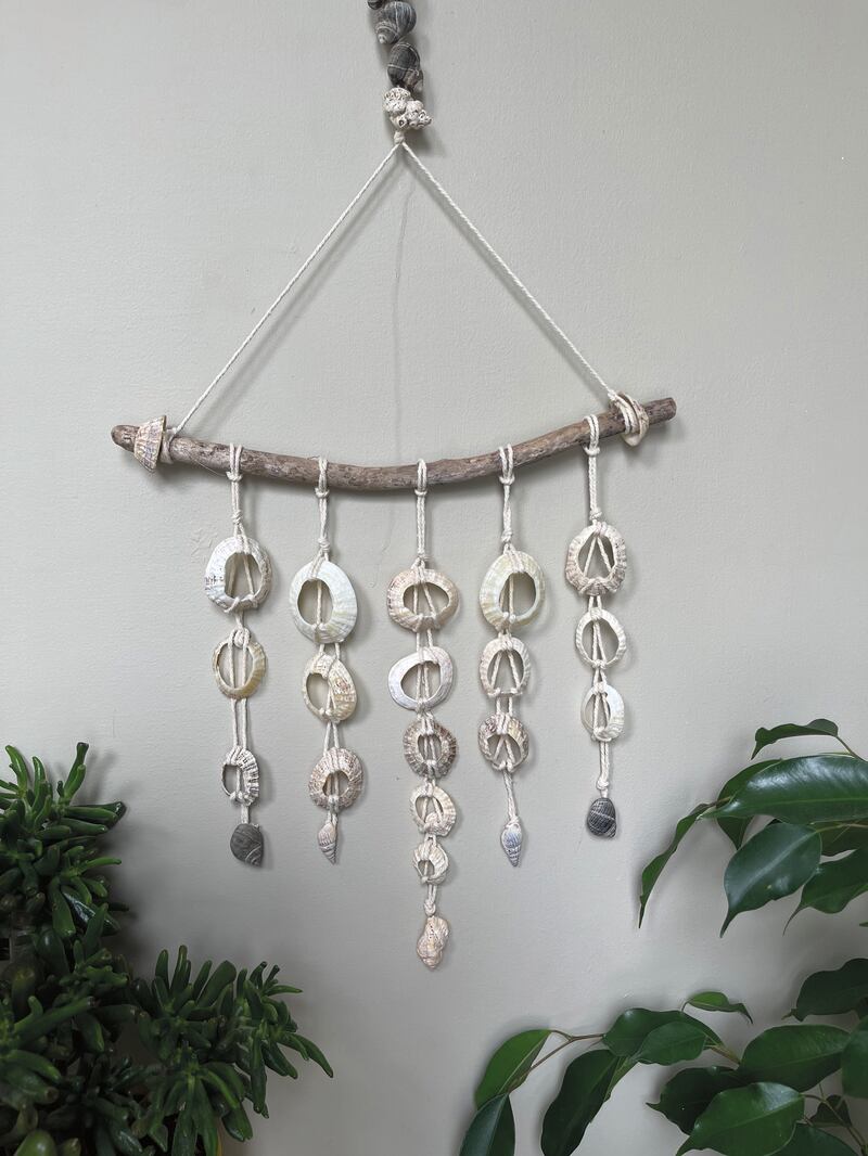 A mix of twine and found shells, this hanging holds on to the memory of summer beach days as we head into autumn