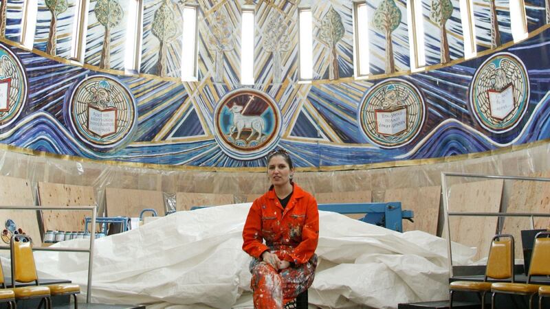 Helen McLean in front of her design for the apse of the Church of the Transfiguration in Cape Cod Bay