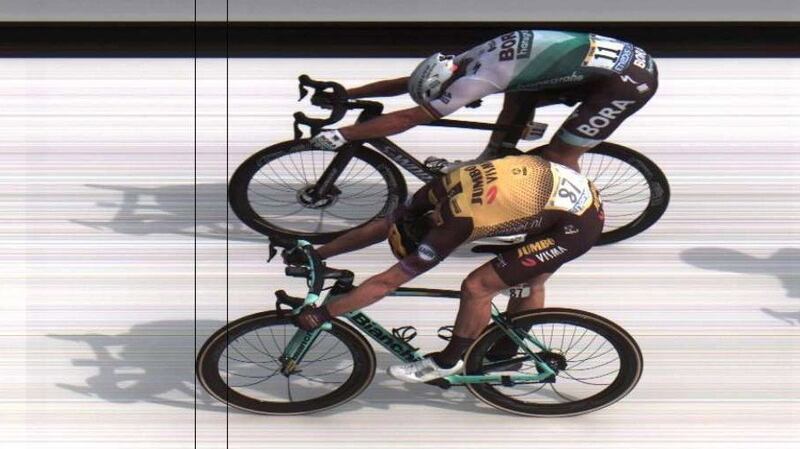 Netherlands’ Mike Teunissen (bottom) takes the first stage of the Tour de France in a photo finish ahead of Slovakia’s Peter Sagan. Photograph: EPA/ASO