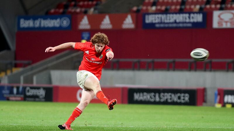 Munster’s Ben Healy kicks the late  conversion to seal victory over Edinburgh at Thomond Park. Dan Sheridan/Inpho