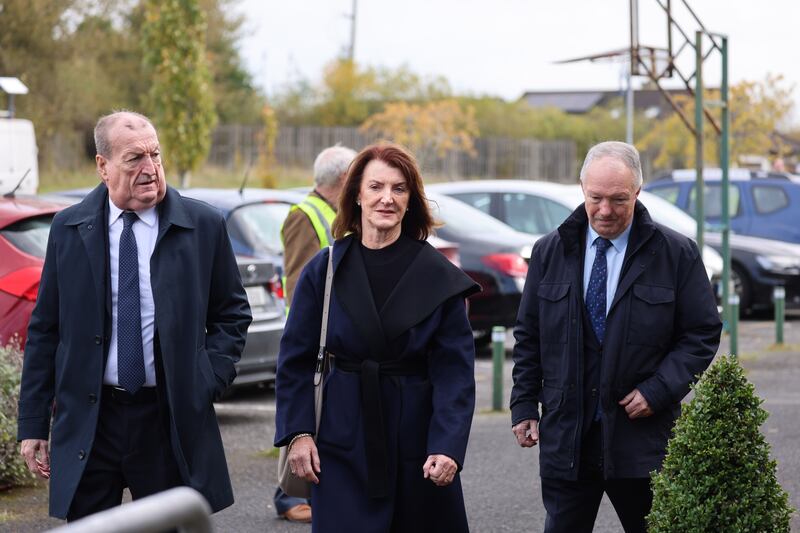 The Haugheys, Ciarán, Eimear and Seán, at the funeral of the former Fianna Fáil minister and deputy leader of the party. Photograph: Dara Mac Dónaill










