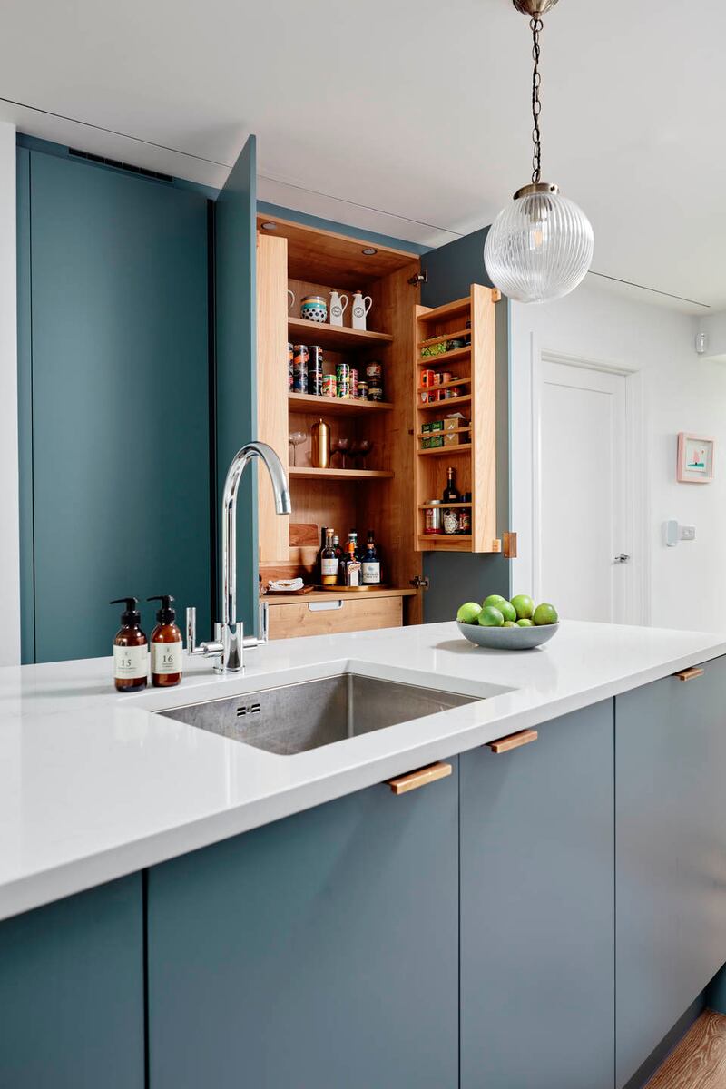 Open-plan kitchen showing the pantry.