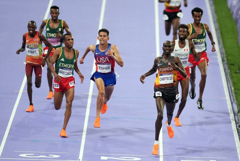 Uganda's Joshua Cheptegei crosses the line to win gold in the men's 10,000m final at the Stade de France. Photograph: Martin Rickett/PA Wire