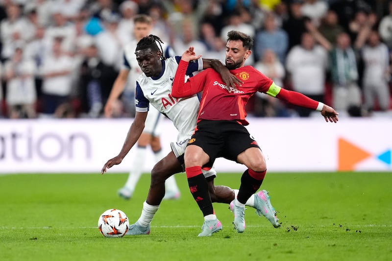 Tottenham Hotspur's Yves Bissouma (left) and Manchester United's Bruno Fernandes battle for the ball during the Uefa Europa League final. Photograph: Nick Potts/PA