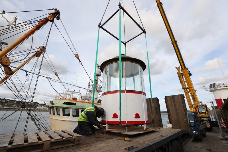 The top section of the lighthouse is prepared to be lifted in to place on the pier. Photograph Nick Bradshaw for The Irish Times