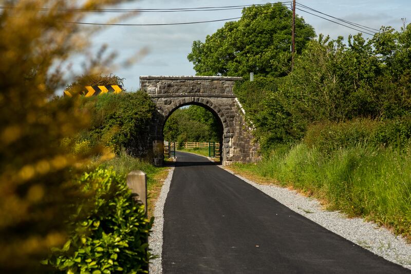 Admire the stonework with beautifully cut local stone on old overhead bridges
