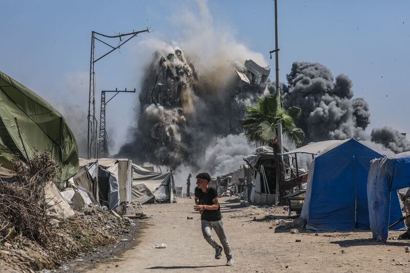 The Mushtaha Tower collapses after an Israeli air strike in the west of Gaza City on Friday. Photograph: EPA