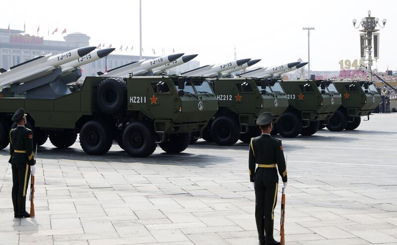 Armoured vehicles carrying the YJ-15 supersonic anti-ship cruise missile. Photograph: EPA