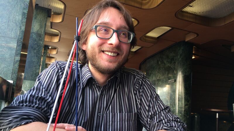 Jan Gregar, a chief organiser of the Czech Freedom Festival, which commemorates the 1989 Velvet Revolution in the then Czechoslovakia. The red, blue and white tripod is the symbol of the 2017 festival, representing the pillars of democracy which should be defended. Photograph: Daniel McLaughlin