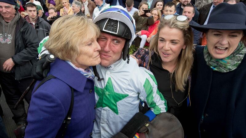 Jessica Harrington celebrates Our Duke’s Grand National win with Power and her daughters Kate and Emma. Photograph: Morgan Treacy