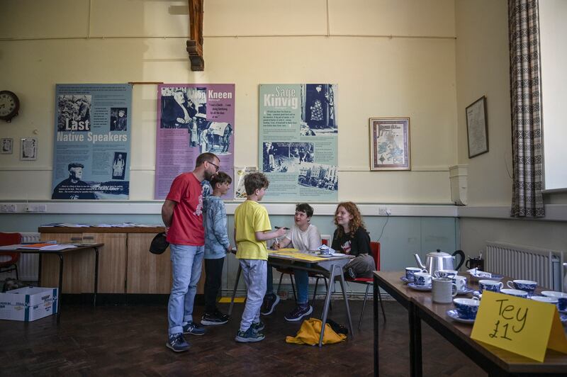 Members of the Manx Language Society write slogans for posters in Manx during a meeting in Ramsey on the Isle of Man. Photograph: Mary Turner/The New York Times