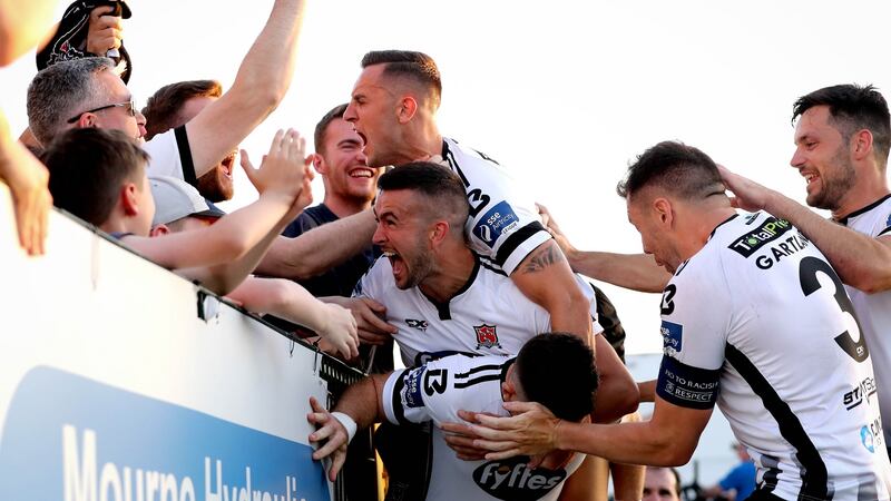 Dundlak celebrate their late winner against Cork City. Photograph: Ryan Byrne/Inpho
