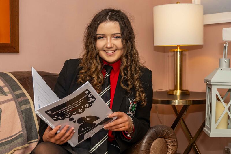 Philippa McIntosh with her research project, Beyond Numbers, which investigated readability issues for dyslexic students sitting Junior Cycle maths exam papers. Photograph: Andy Gibson.