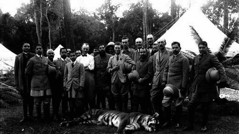 The Prince of Wales in 1921 with his first dead tiger. On his right is Gen Sir Bauber Shum Shere Jung, son of the Maharajah. Photograph: PA
