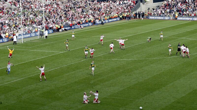 Tyrone players celebrate at the final whistle after winning the 2015 final. Photograph: Donall Farmer/Inpho