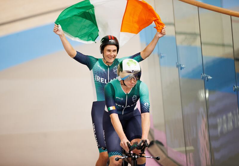 Para track cyclists Eve McCrystal and Katie-George Dunlevy celebrate winning silver at the Vélodrome de Saint-Quentin-en-Yvelines on Sunday. Photograph: Tom Maher/Inpho