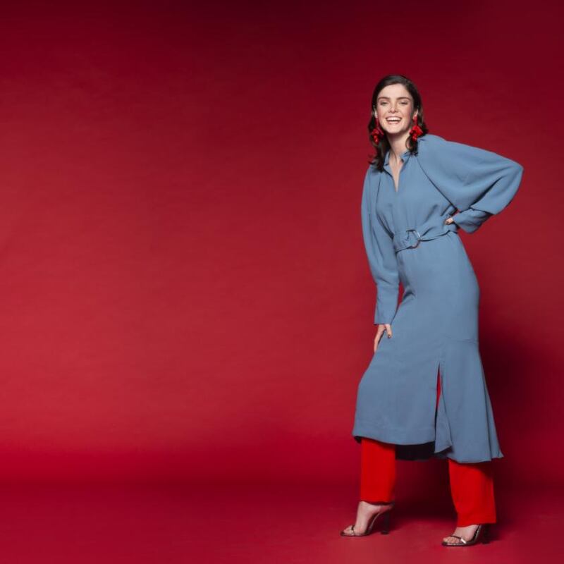 Floral earrings, €379, Oscar De La Renta, Loulerie; blue dress, €710, Eudon Choi, Beautiful South; red trousers, €520, Isabel Marant, Costume, silver logo heels, €1,095, Saint Laurent, Brown Thomas