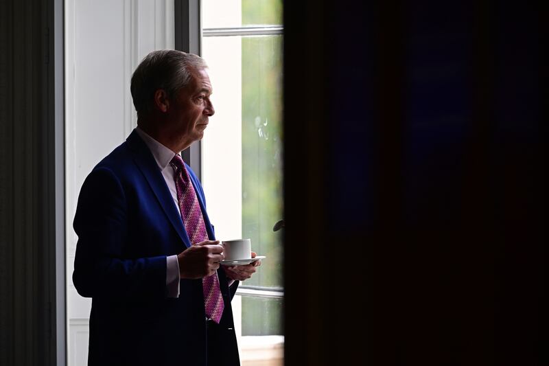 Nigel Farage takes a cup of tea in advance of a speech in London this week by former British prime minister Liz Truss. Photograph: Leon Neal/Getty Images