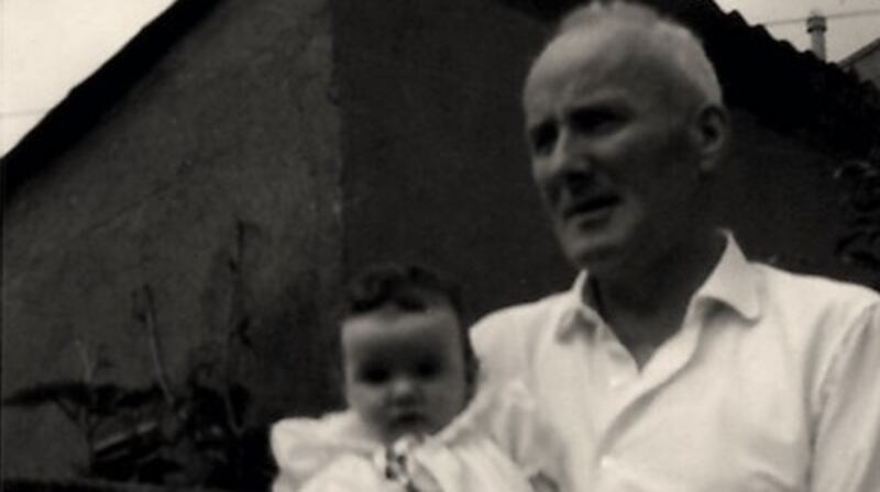 Anne Tannam as a baby with her father