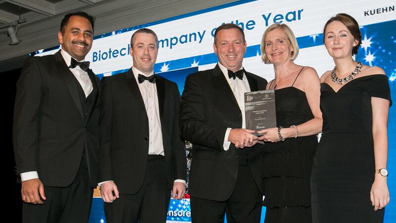 Peter McNamara, Managing Director, Micro-Bio Ireland presents the Biotech Company of the Year award to the Sanofi Waterford team