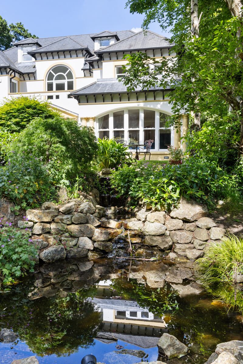 The property has a water feature to the front