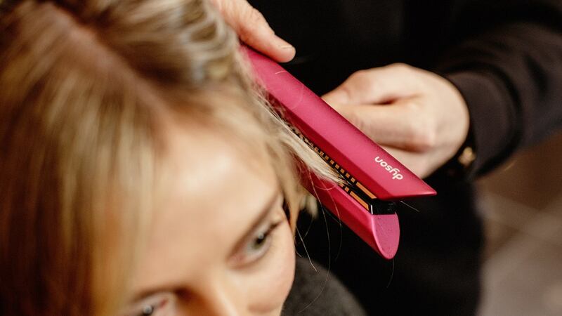 Bradshaw uses the Corrale to make a half turn with the hair to create a relaxed wave
