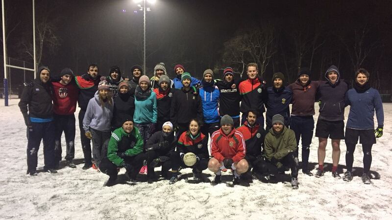 during the big snow in 2017, along with friends from Vienna Gaels GAA Club. I’m in the red in the front row, knees bared.