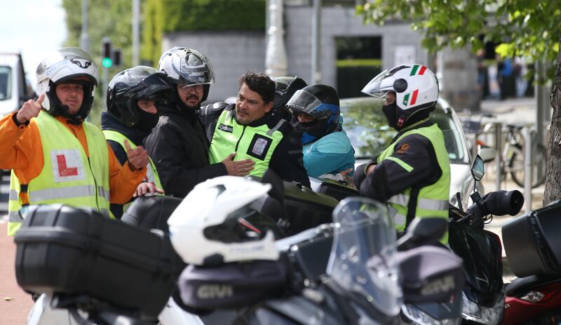Delivery riders outside court after George Gonzaga Bento was acquitted of the murder of Josh Dunne on Tuesday. Photograph: Collins Courts