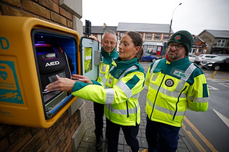 Community First Responders Nick Botfiled, Anne Brennan and Paul Phelan with one of the defibrillator's located on Main Street, Newbridge, Kildare. Photograph Nick Bradshaw
