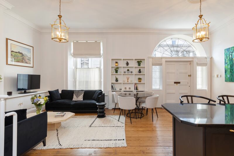 The property has its own Georgian front door