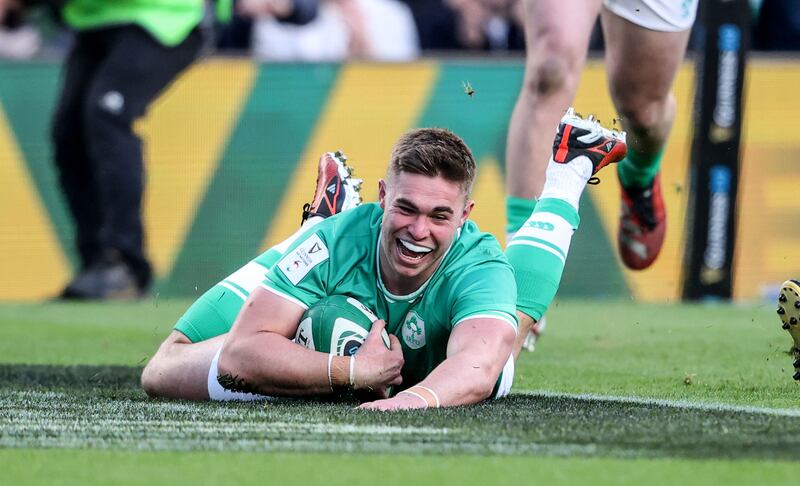 Ireland’s Jack Crowley scores his side's opening try in the comprehansive victory over Italy at the Aviva Stadium. Photograph: Dan Sheridan/Inpho